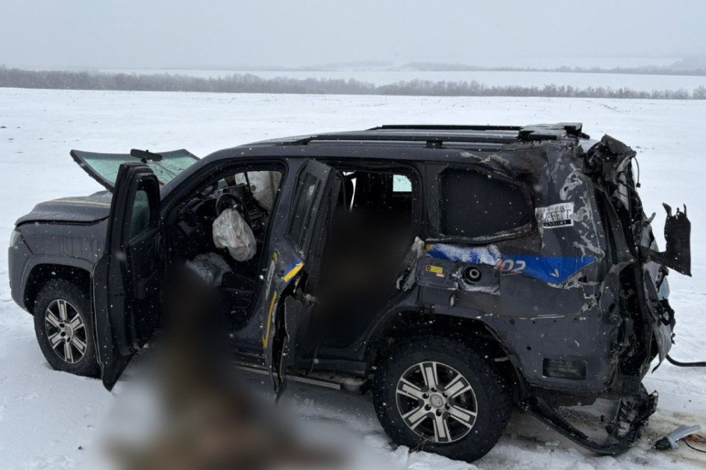 Two Ukrainian Police Officers Killed in Drone Attack While Evacuating Civilians The aftermath of the attack on the police vehicle, where two officers from the “White Angels” evacuation unit were killed by a Russian drone in the Kupiansk region. (Source: National Police of Ukraine)