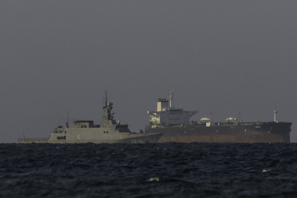 A Venezuelan navy patrol boat escorts a Panamanian-flagged crude oil tanker Yoselin near the El Palito refinery in Puerto Cabello, Venezuela, on November 11, 2025. (Source: Getty Images) A Venezuelan navy patrol boat escorts a Panamanian-flagged crude oil tanker Yoselin near the El Palito refinery in Puerto Cabello, Venezuela, on November 11, 2025. (Source: Getty Images)