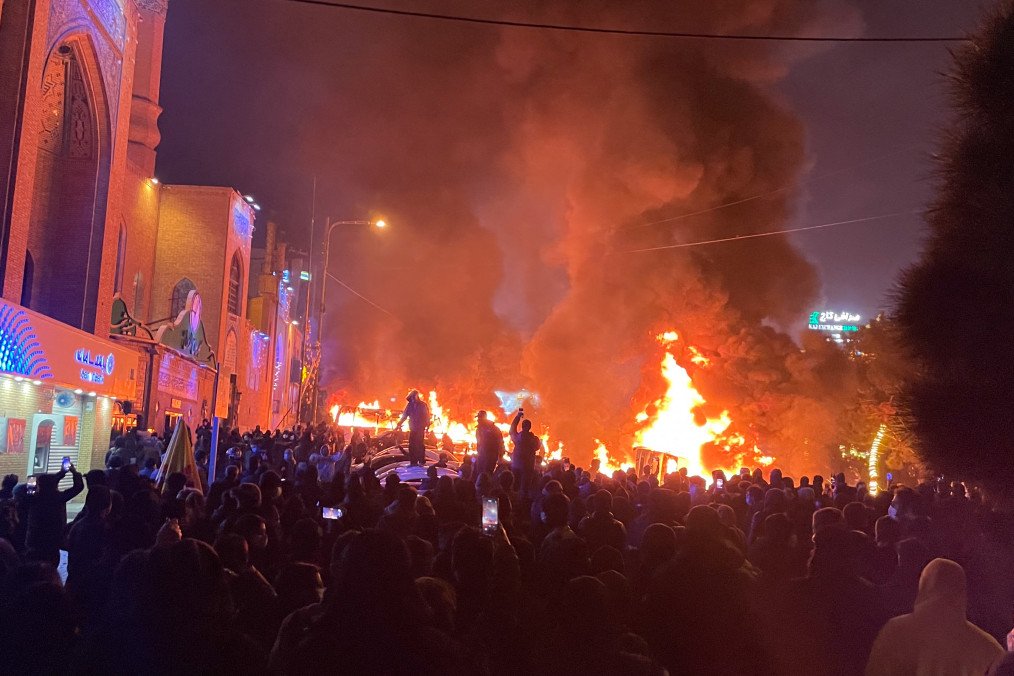 Iranian protesters block a street near a burning car during mass anti-government demonstrations in Tehran, January 8, 2026. (Photo: Getty Images) Iranian protesters block a street near a burning car during mass anti-government demonstrations in Tehran, January 8, 2026. (Photo: Getty Images)