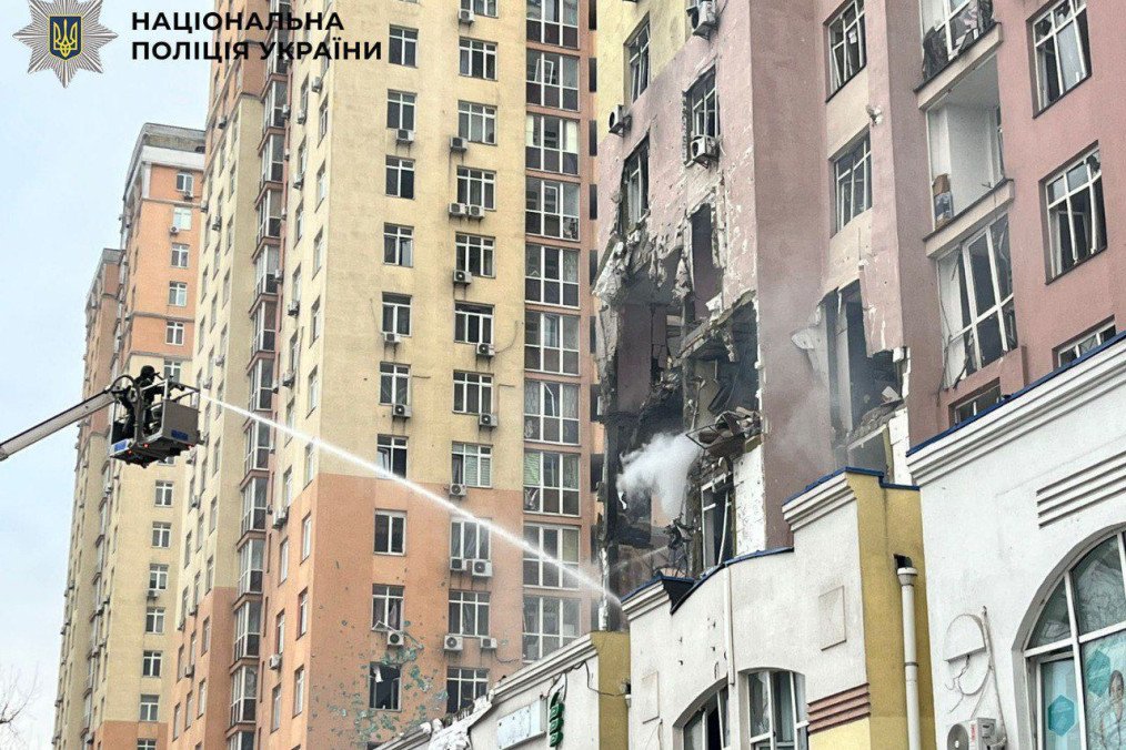 Rescue teams deploy high-pressure hoses to contain a fire in a high-rise apartment block that sustained a direct hit during the attack. (Source: National Police of Ukraine)