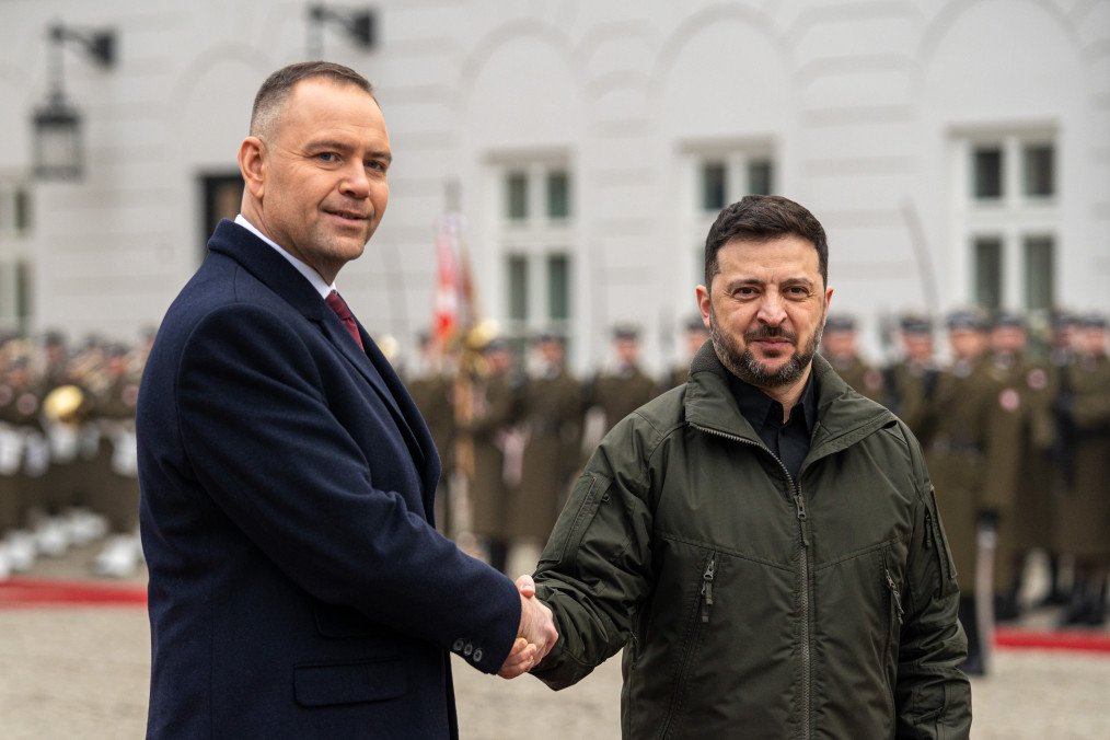 Karol Nawrocki, Poland's president, left, welcomes Volodymyr Zelenskiy, Ukraine's president, at the Presidential Palace in Warsaw, Poland, on December 19, 2025. (Source: Getty Images)