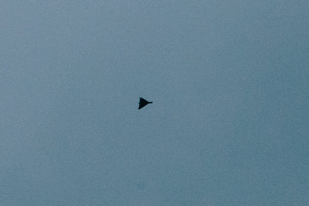 A Shahed-type drone flies in the sky. (Source: Getty Images)