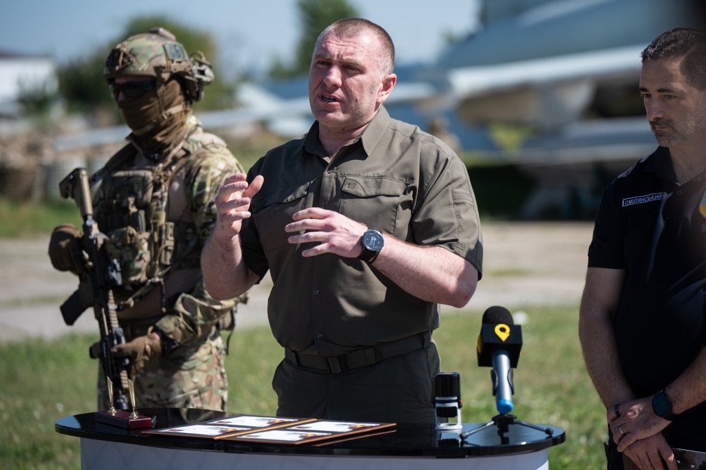 SBU Chief Vasyl Maliuk marks the release of a postage stamp honoring Operation Spiderweb near a disabled Tu-22M3 bomber at the Ukraine State Aviation Museum, September 5, 2025. (Source: Getty Images)