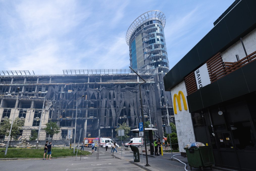 McDonald’s restaurant near Kyiv’s Lukianivska metro station stands beside heavily damaged buildings following Russia’s massive missile and drone attack on the Ukrainian capital on May 24, 2026. (Source: Getty Images)