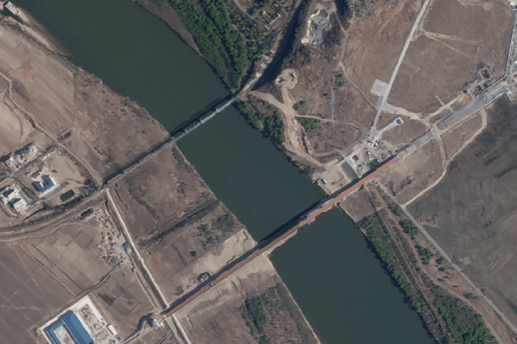 Satellite imagery displays the new road bridge built parallel to the existing rail-only Friendship Bridge across the Tumen River. (Source: The Guardian / Ukrainian human rights organization Truth Hounds)