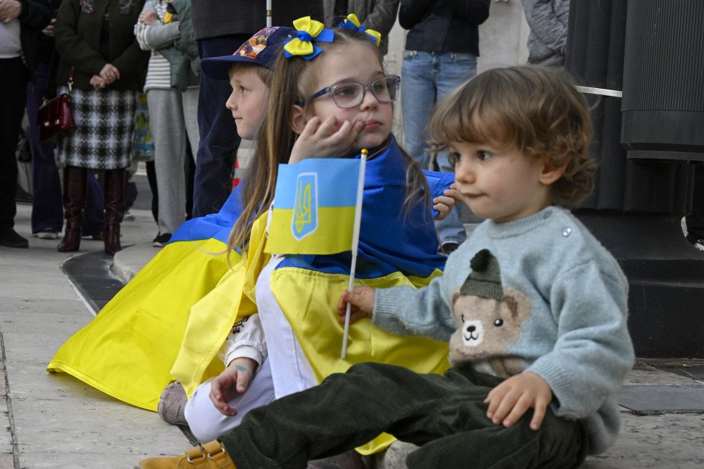 Little children are draped in national colors as Ukrainian residents on February 22, 2026 in Lisbon, Portugal. Illustrative photo. (Source: Getty Images)