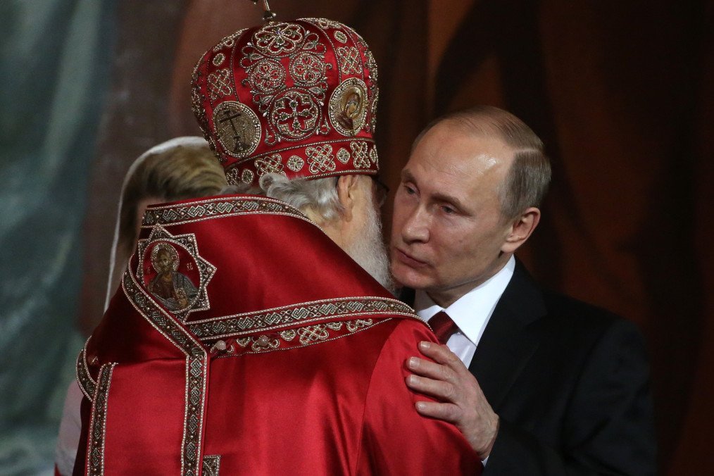 Russian leader Vladimir Putin embraces Patriarch Kirill during Orthodox Easter service at Moscow’s Christ the Saviour Cathedral in April 2017. (Source: Getty Images) Russian leader Vladimir Putin embraces Patriarch Kirill during Orthodox Easter service at Moscow’s Christ the Saviour Cathedral in April 2017. (Source: Getty Images)