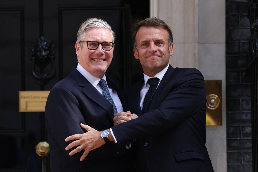 Prime Minister Keir Starmer (L) greets President of France Emmanuel Macron at 10 Downing Street ahead of a France/UK Summit. (Source: Getty Images)