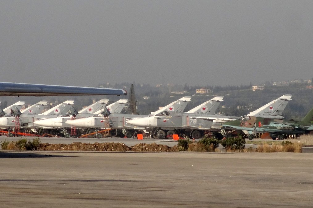 Russian fighter jets parked on the tarmac at the Hmeimim airbase in Syria’s Latakia region, February 2016. (Source: Getty Images)