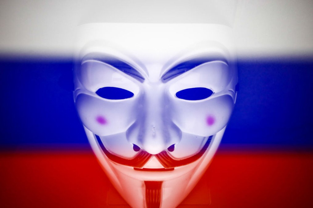 Russian flag displayed on a laptop screen and Guy Fawkes mask are seen in this multiple exposure illustration photo. (Source: Getty Images) Russian flag displayed on a laptop screen and Guy Fawkes mask are seen in this multiple exposure illustration photo. (Source: Getty Images)