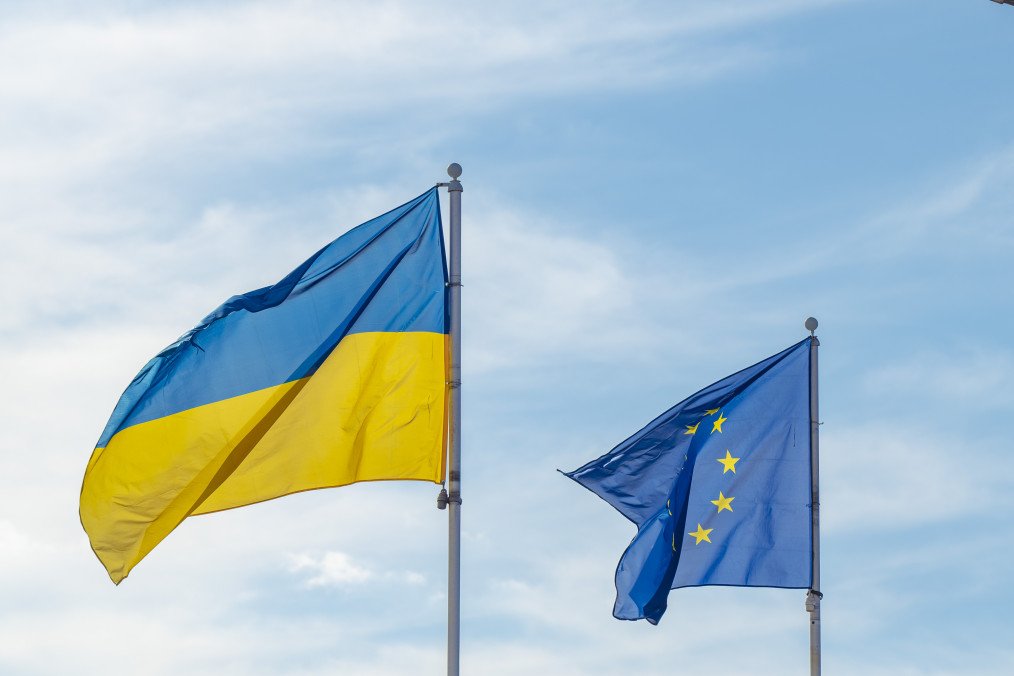 Ukrainian and European Union flags waving together in the wind against a bright sky, symbolizing Ukraine’s path toward European integration. (Source: Getty Images) Ukrainian and European Union flags waving together in the wind against a bright sky, symbolizing Ukraine’s path toward European integration. (Source: Getty Images)