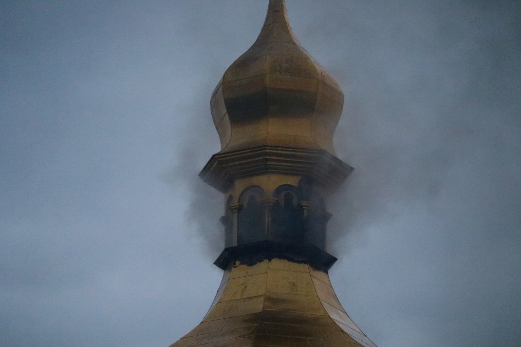 UK May Join International Effort to Restore Damaged Kyiv-Pechersk Lavra Smoke rises from a fire on the roof of the Dormition Cathedral of the Kyiv Pechersk Lavra. (Source: Getty Images)