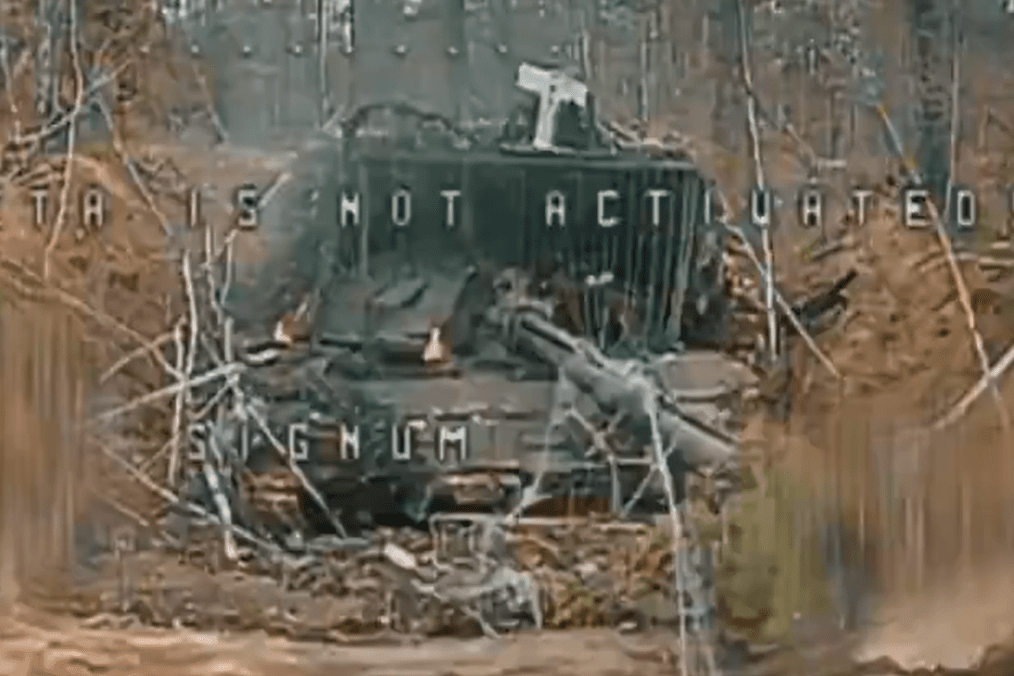 Masked Russian T-72B3 tank moments before being burned by Ukrainian FPV-drones. (Source: umftteam/X)