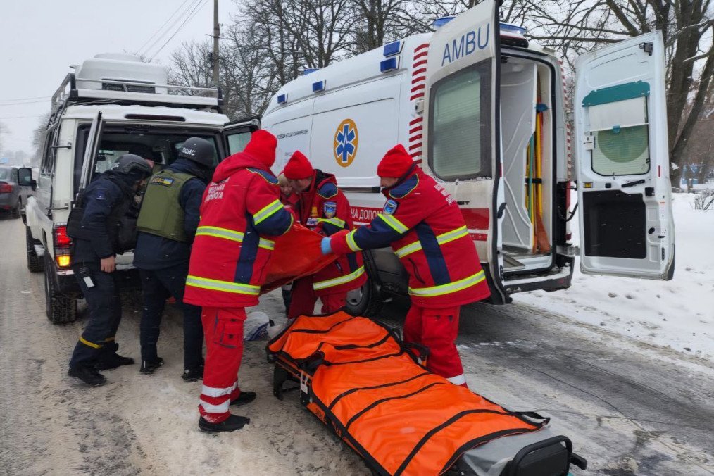 Emergency medics and rescuers carry an injured resident on a stretcher after Russian artillery fire hit a residential area, January 16, 2026. (Photo: Dnipropetrovsk Regional Military Administration)