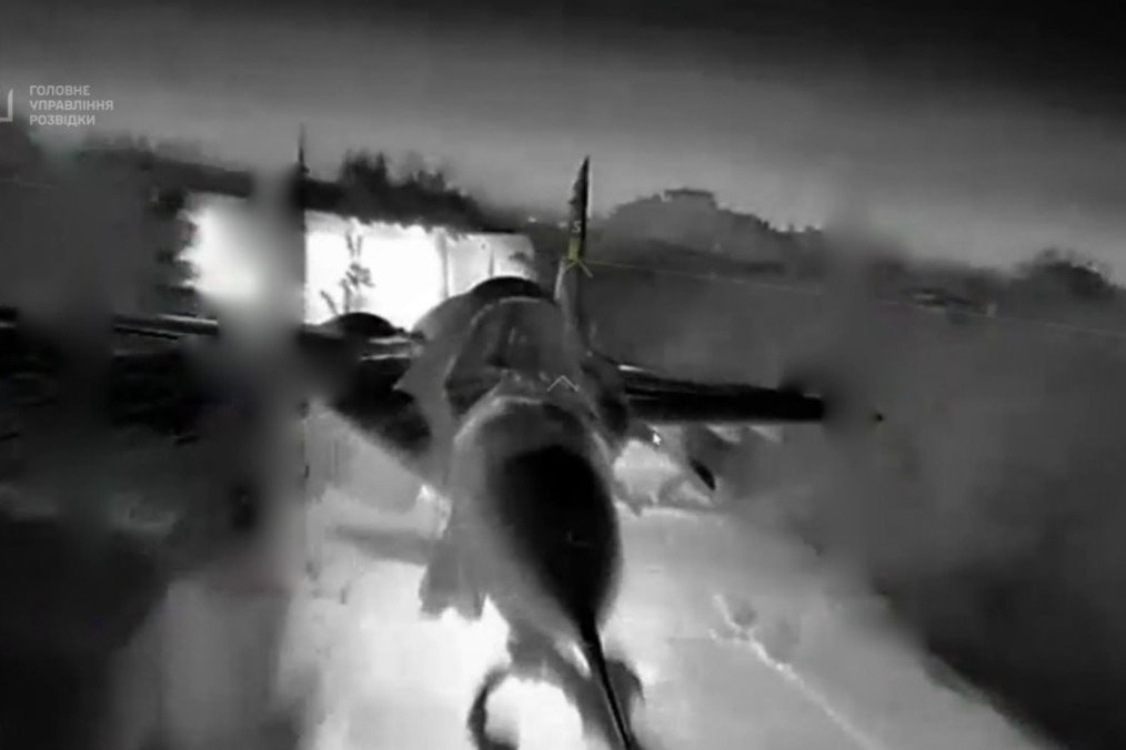 A Russian MiG-29 fighter jet at Belbek air base in occupied Crimea before being struck during a Ukrainian HUR drone operation. (Source: HUR)