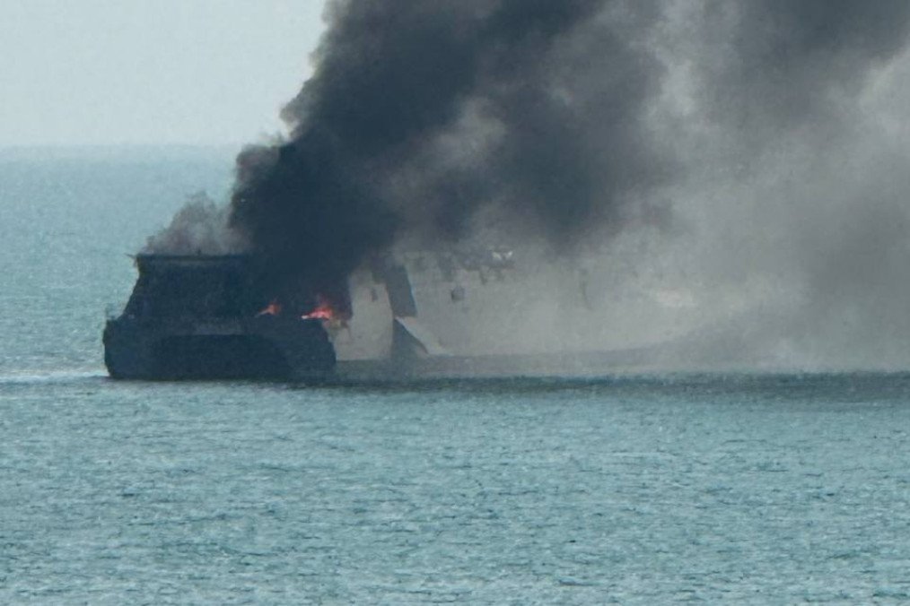 IRGC Navy’s IRIS Shahid Sayyad Shirazi, Soleimani-class corvette, in smoke after the US strike, March 2026. (Source: hey_itsmyturn/X)