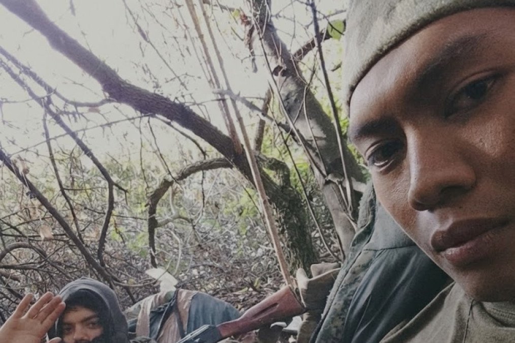 Foreign mercenary who fought for Russian forces is seen in a wooded area. (Photo: HUR)