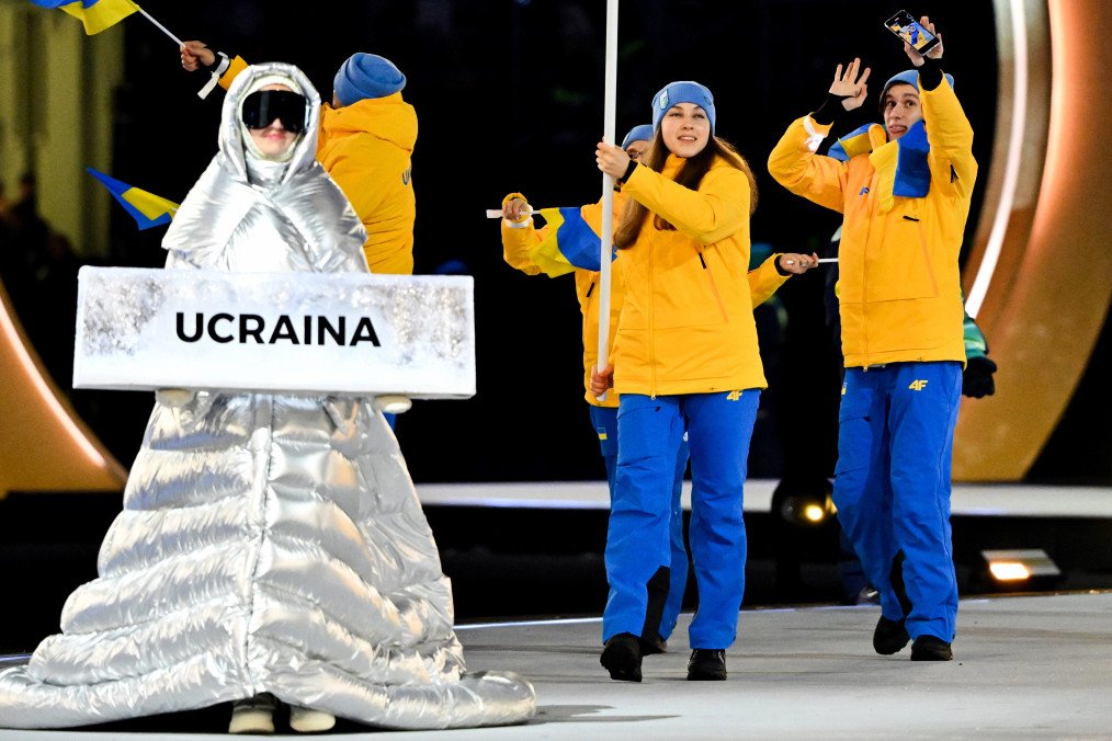 Russian national Anastasia Kucherova leads Ukrainian team in the athletes' parade during the opening ceremony of the Milano Cortina 2026 Winter Olympics at San Siro Stadium on February 6, 2026 in Milan, Italy. (Photo: Getty Images)