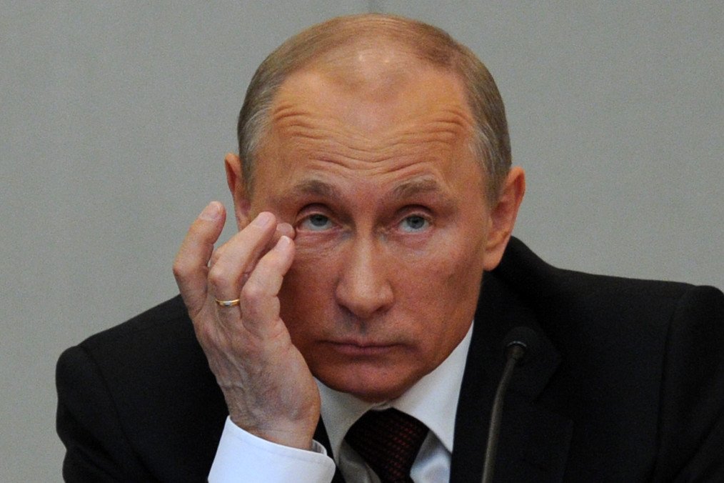 Russia's leader Vladimir Putin makes a pause as he speaks in the State Duma, the lower house of parliament, in Moscow, on April 11, 2012.