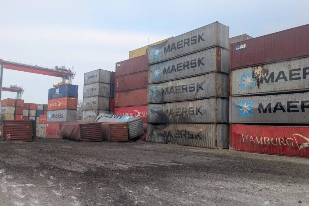 Stacks of shipping containers at the port, several knocked over and damaged. (Photo: Oleksii Kuleba)
