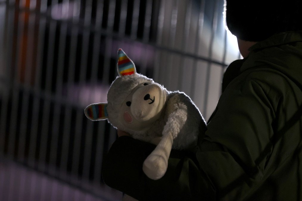 Ukraine Returns 13 Children From Russian-Occupied Kherson Region A boy holds a stuffed animal in his arms. Illustrative image. (Source: Getty Images)