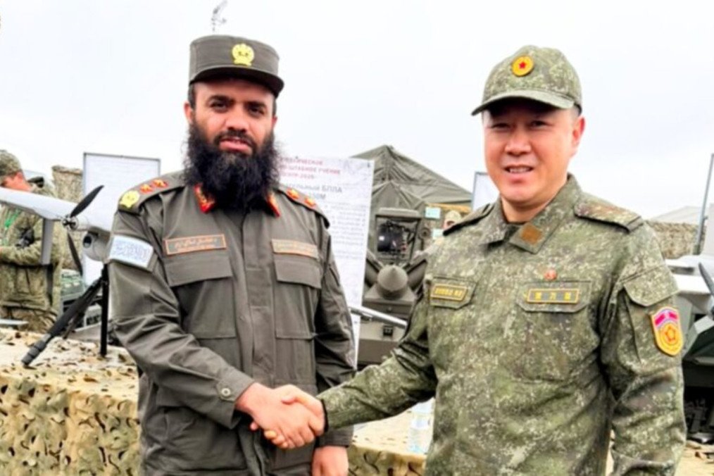 Nasibullah Madani and North Korean military attaché Ro Ki Chol at a weapons exhibition during Russia’s Center-2026 drills. (Source: Afghanistan Defense Ministry)