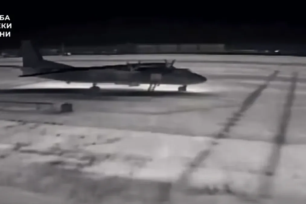 Thermal drone footage shows a Russian An-26 military transport aircraft moments before a Ukrainian strike. (Source: Security Service of Ukraine)