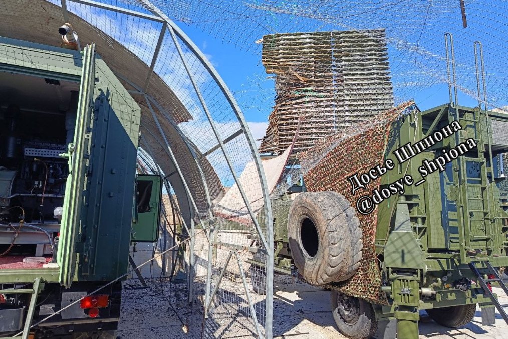 Components of the Russian RSP-28ME airfield radar system protected with anti-drone netting at Belbek air base in occupied Crimea. (Source: Dosye Shpiona)