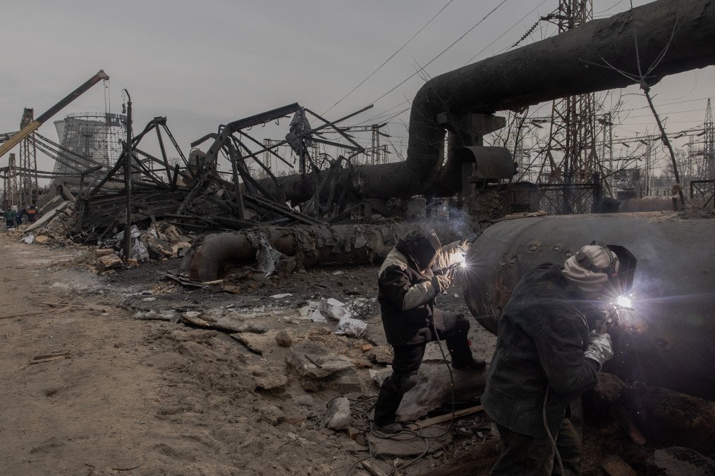 Workers repair damage at Kyiv’s Darnytska power plant after Russian air strikes on February 4, 2026. (Photo: Getty Images)