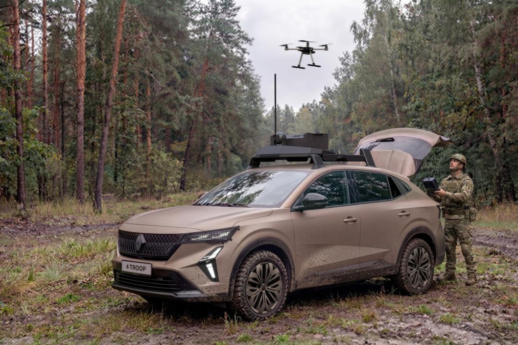 The 4 TROOP prototype hybrid multi-role vehicle, jointly developed by Renault Group and Thales, shown deployed in a wooded environment. (Source: Thales)
