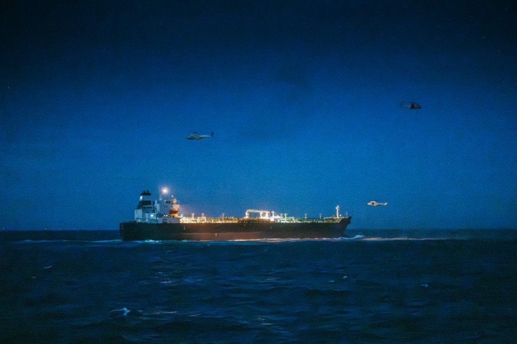 Nighttime operations show multiple military helicopters surrounding the Ethera tanker as Belgian and French forces take control of the vessel. (Source: Theo Francken) Nighttime operations show multiple military helicopters surrounding the Ethera tanker as Belgian and French forces take control of the vessel. (Source: Theo Francken)