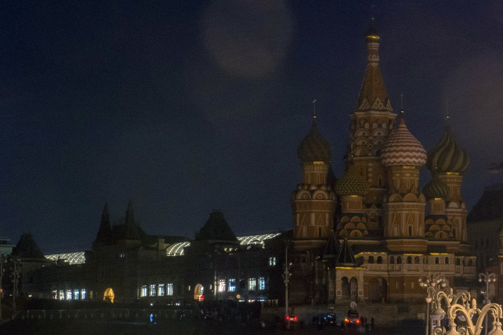 Illustrative image. A picture taken on March 25, 2017, in Moscow, shows St.Basil’s Cathedral and the GUM department store after being submerged in darkness for the Earth Hour environmental campaign. (Source: Getty Images)