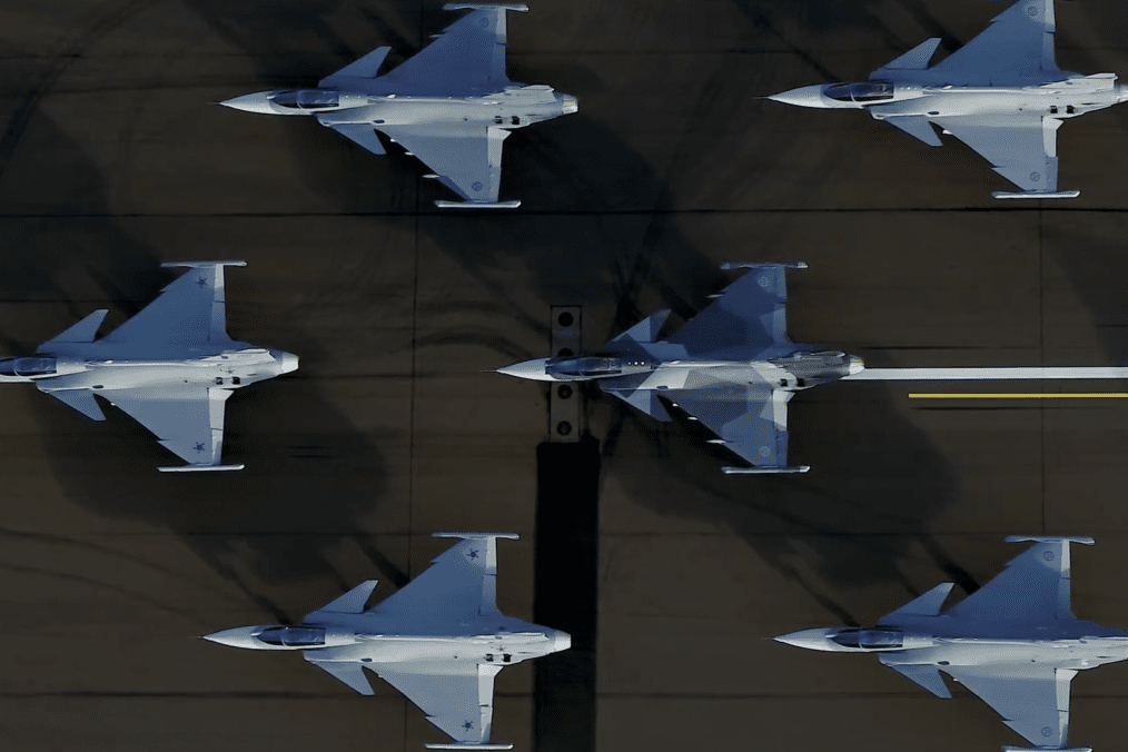 Multiple Saab JAS 39 Gripen fighter jets stand parked on the ground. (Source: Ukrainian President Volodymyr Zelenskyy)