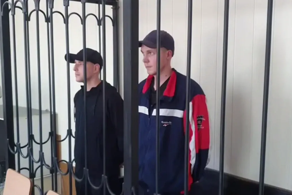 Russian Court Sentences Two Azov Fighters to 24 and 26 Years in Sham Trial Russian Court Sentences Two Azov Fighters to 24 and 26 Years in Sham Trial