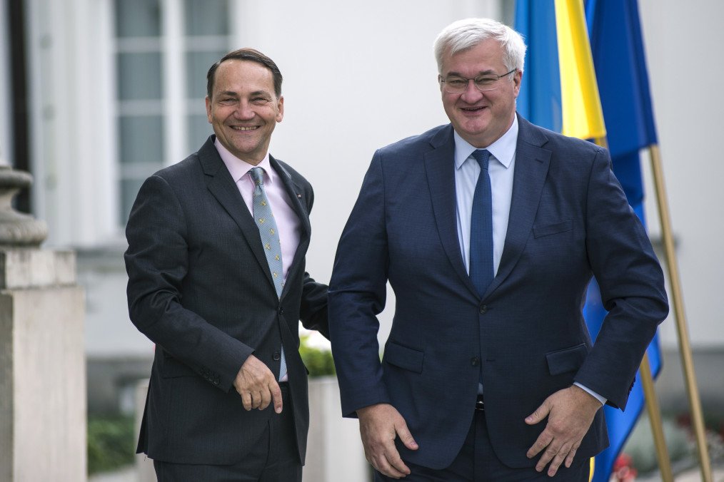 Ukraine Proposes Roadmap to Resolve Historical Disputes With Poland Polish Foreign Minister Radosław Sikorski and Ukraine's Foreign Minister Andrii Sybiha. (Source: Getty Images)