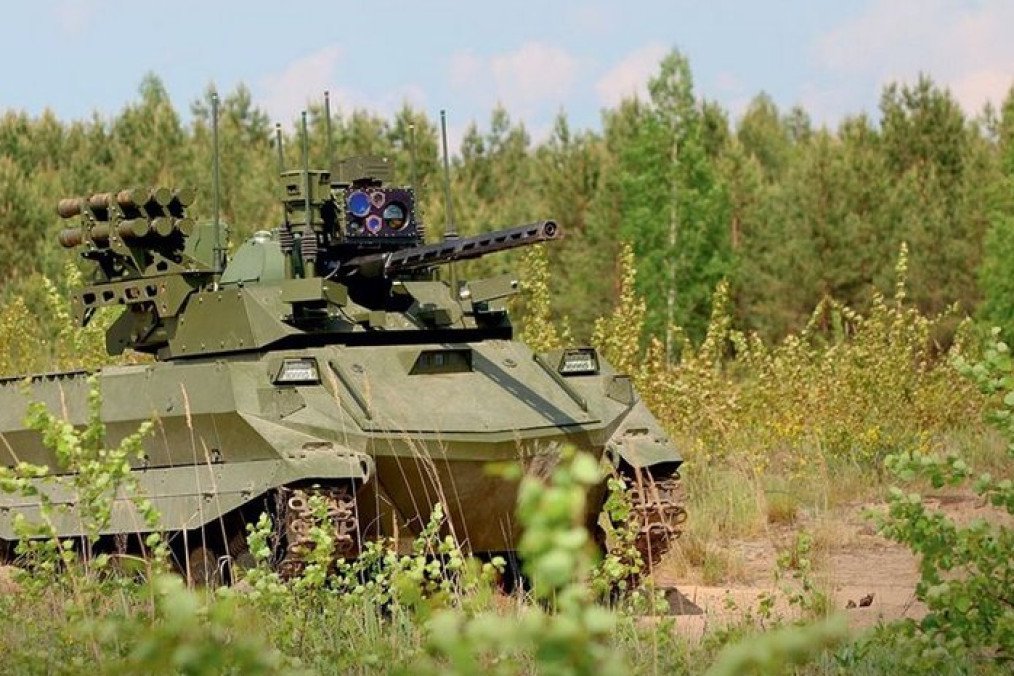 Russian Uran-9 unmanned ground combat vehicle equipped with a remote-controlled cannon and anti-tank missiles during field deployment. (Source: Russian media)