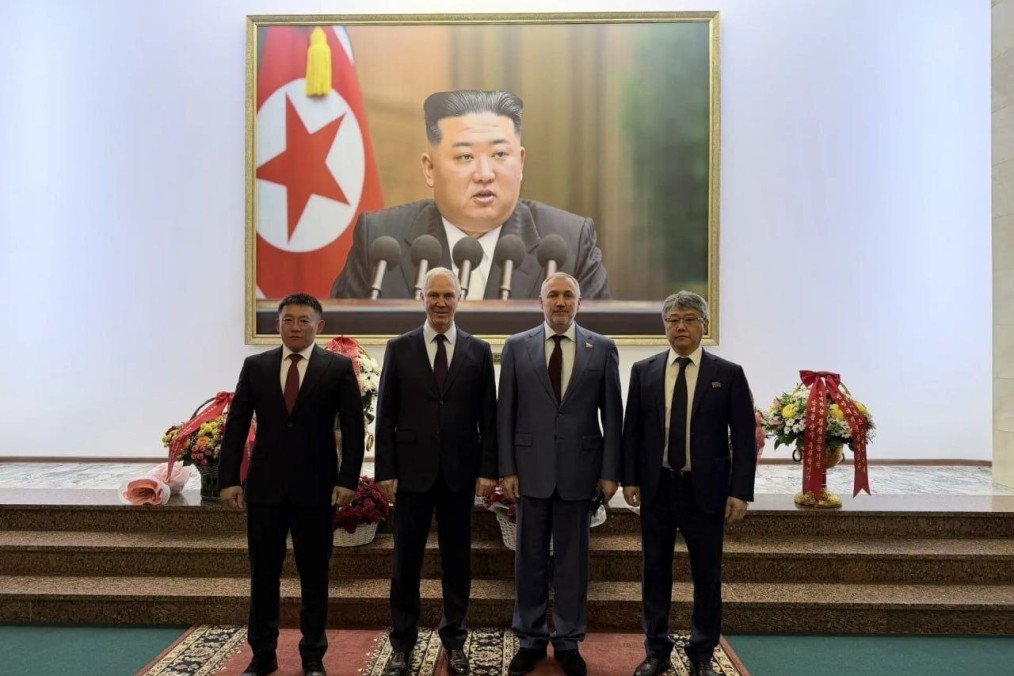 Russian-installed governor of the temporarily occupied Kherson region, Vladimir Saldo (second from right), stands with North Korean officials at the DPRK Embassy in Moscow, Russia. (Source: Russian media)