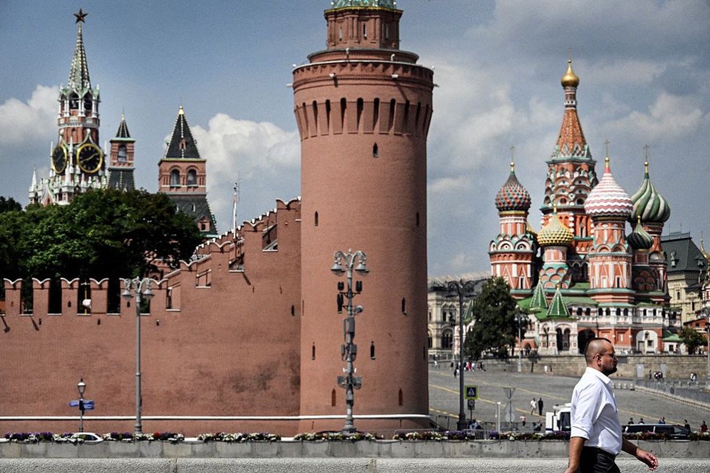 A pedestrian walks past the Kremlin and St. Basil’s Cathedral (R) in downtown Moscow on July 28, 2026. (Source: Getty Images) A pedestrian walks past the Kremlin and St. Basil’s Cathedral (R) in downtown Moscow on July 28, 2026. (Source: Getty Images)