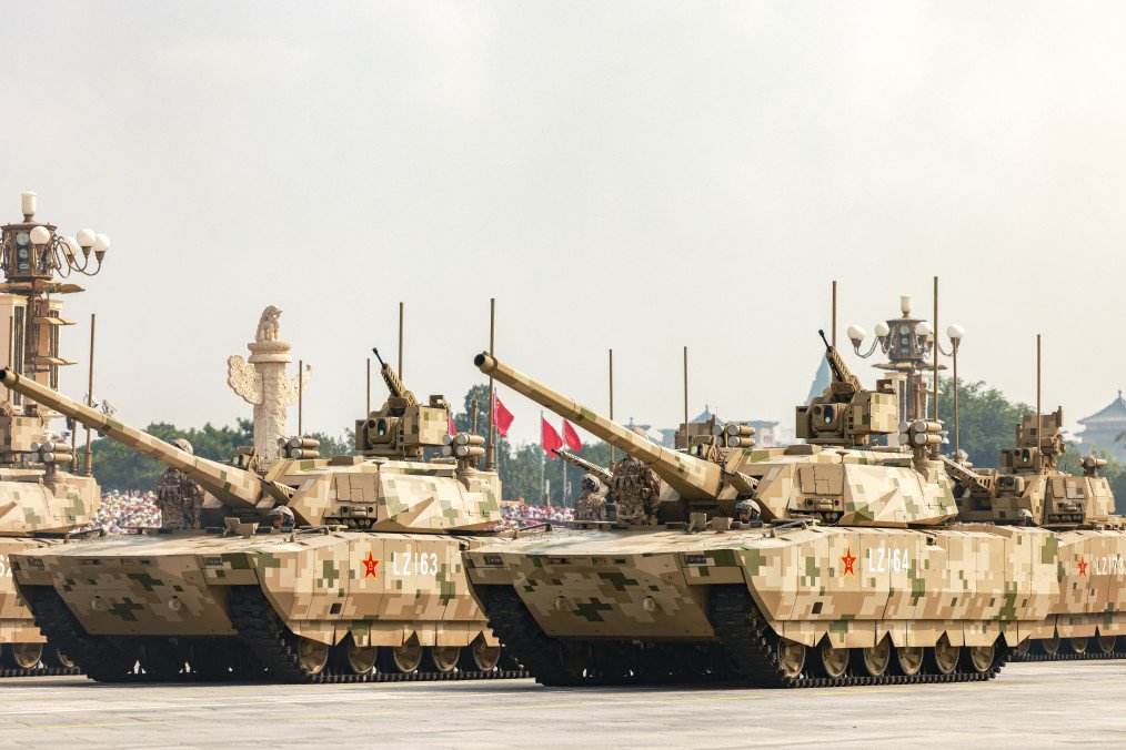 Type-100 tanks of the ground assault formation are reviewed during the V-Day military parade on September 3, 2025 in Beijing, China. (Source: Getty Images)