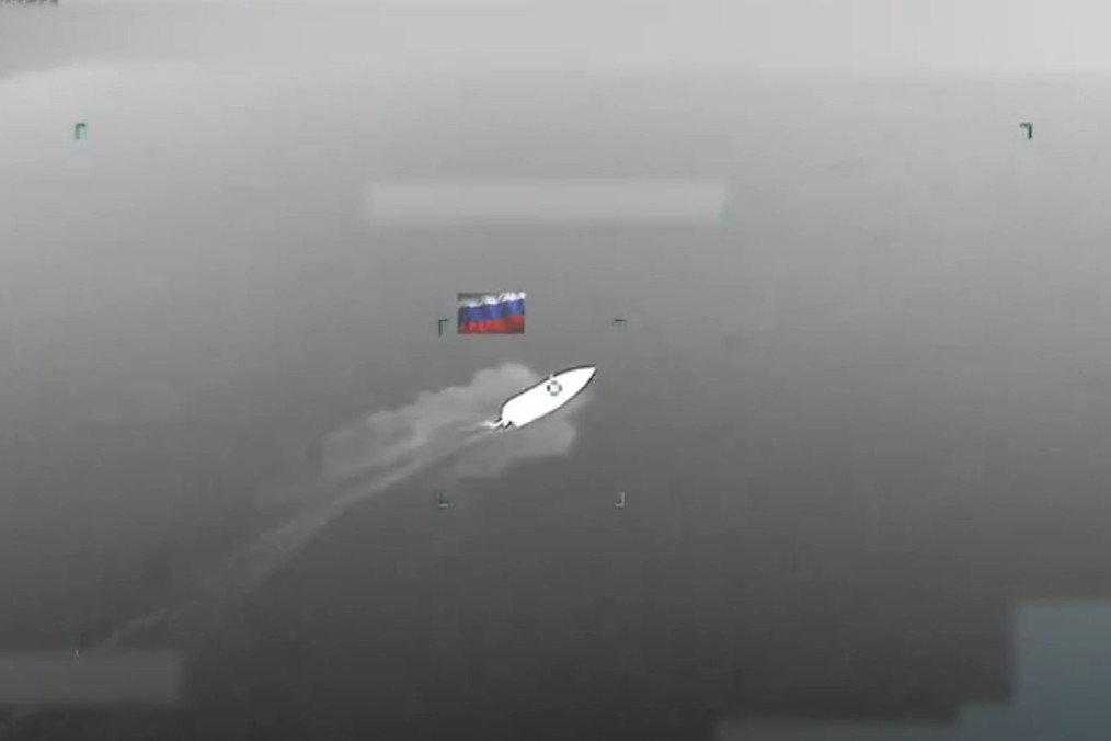 A Russian logistics boat moments before being struck by a Ukrainian Navy drone near the temporarily occupied Tendra Spit. (Source: Ukrainian Navy)