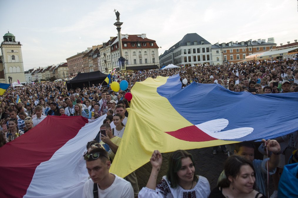 Protesters hold a massive Ukrainian flag during the rally, marking Ukraine's Independence Day. (Photo: Attila Husejnow/SOPA Images/LightRocket via Getty Images)