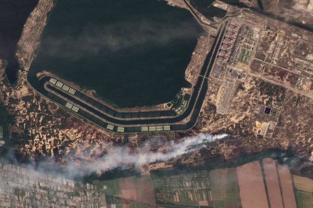 An illustrative satellite image shows the Zaporizhzhia Nuclear Power Plant and the surrounding area in Enerhodar, Ukraine.