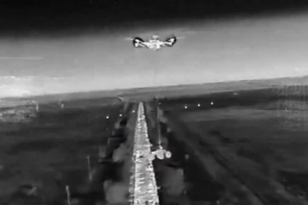 A heavy Ukrainian bomber drone transports an unmanned ground vehicle (UGV) during a combat mission. (Source: Arkhangel Spetsnaza/Telegram) A heavy Ukrainian bomber drone transports an unmanned ground vehicle (UGV) during a combat mission. (Source: Arkhangel Spetsnaza/Telegram)