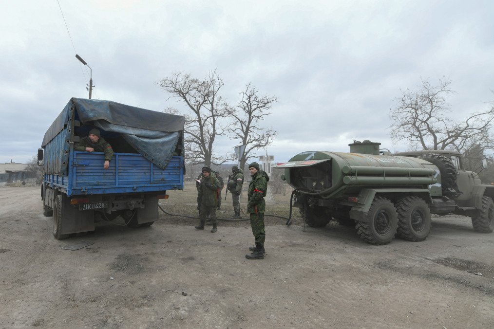 Russian militia, in uniforms without insignia, gather in Mykolaivka and Bugas, in the Donetsk region, Ukraine, on March 01, 2022. Russian militia, in uniforms without insignia, gather in Mykolaivka and Bugas, in the Donetsk region, Ukraine, on March 01, 2022.