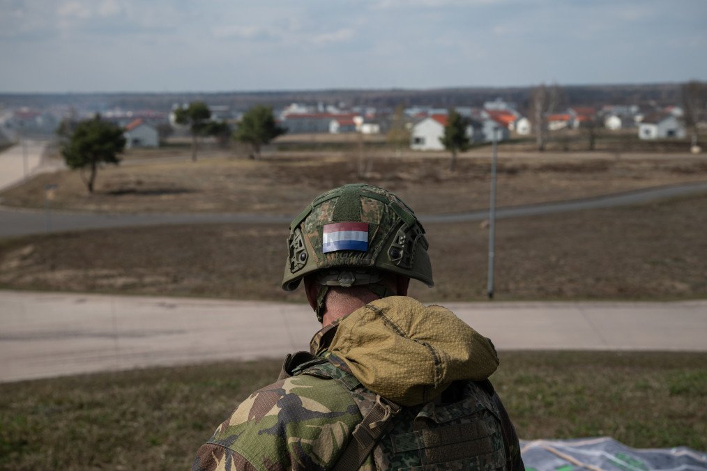 A Dutch soldier looks out onto the military training city of “Schnöggersburg,” during Bastion Lion military exercise on April 09, 2025, near Gardelegen, Germany. A Dutch soldier looks out onto the military training city of “Schnöggersburg,” during Bastion Lion military exercise on April 09, 2025, near Gardelegen, Germany.