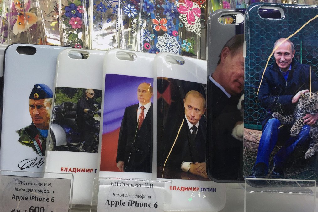Illustrative image. Mobile phone covers bearing the courageous images of Russian leader Vladimir Putin are seen at a shop in Moscow on May 04, 2016. (Source: Getty Images)