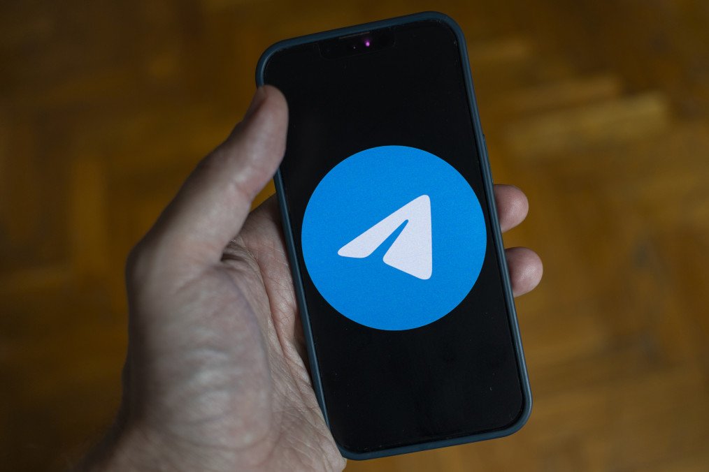 A man holding a mobile phone opens the Telegram messenger on his device in Novi Sad, Serbia, on March 31, 2026. (Source: Getty Images)