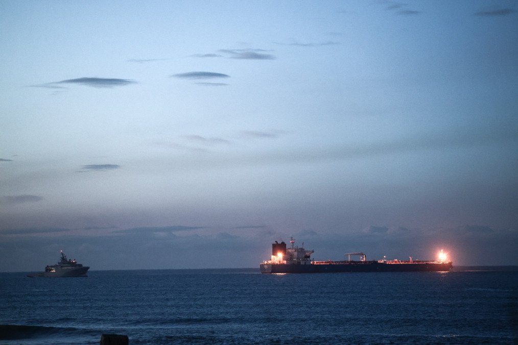 The oil tanker Grinch, suspected of operating within Russia’s shadow fleet, is monitored by a French Navy vessel near the port of Marseille-Fos in Martigues, France, January 25, 2026. (Source: Getty Images)