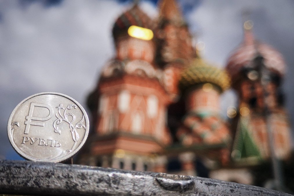 A Russian ruble coin is pictured in front of St. Basil’s Cathedral in downtown Moscow on September 12, 2025. (Source: Getty Images)