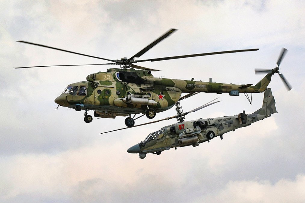 A Russian Mi-8 (front) and Ka-52 attack helicopter (rear) during training. (Photo: Russian military)